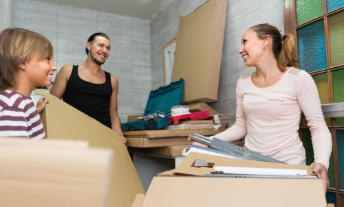 Local man and van removals service in Roehampton with moving van and boxes