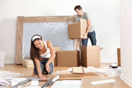 Removal van outside a residential property with careful loading