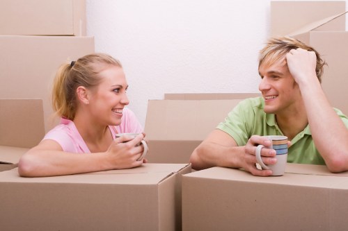 Removal van and moving team handling house removals in Roehampton