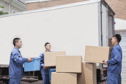 Packed moving boxes and furniture for a Roehampton relocation