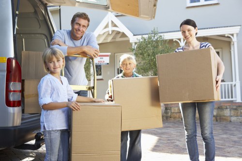 Unpacking household items into a new Roehampton property