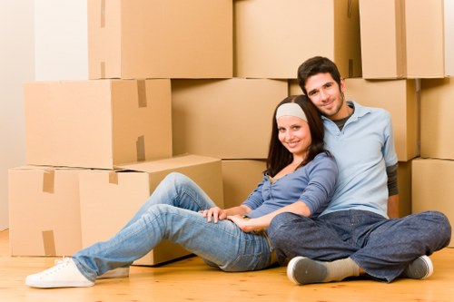 Careful loading of office furniture for a Roehampton business relocation