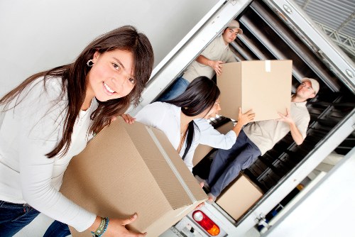Boxes and household items being prepared for transport