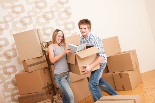 Loading furniture into a moving truck in Roehampton