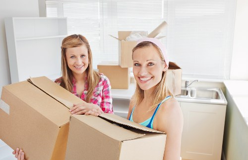 Packed boxes and furniture ready for house removals in Roehampton